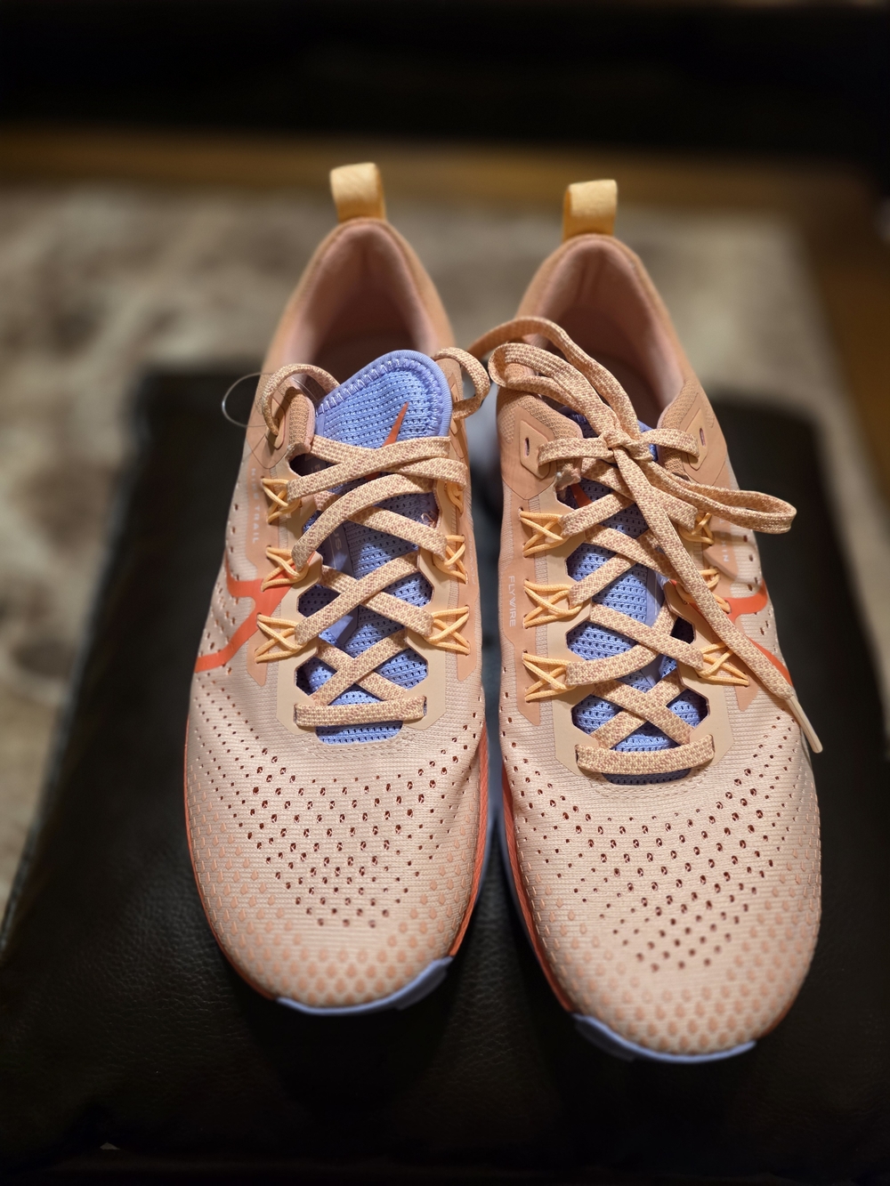 Nike Women's React Pegasus Trail 4 in the Arctic Orange/Magic Ember colorway